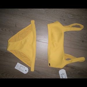 NWT SOFT YELLOW ROXY SWIMSUIT
